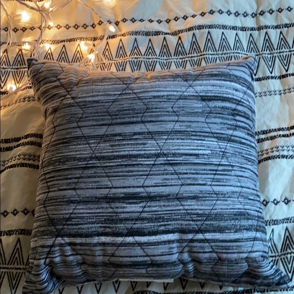 Heathered grey throw pillow